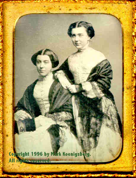 Quarter-plate daguerreotype of Two Pretty Women Holding a quarter-plate daguerreotype
