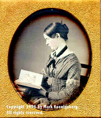 Sixth-plate daguerreotype of Woman in Profile Looking at Art Book